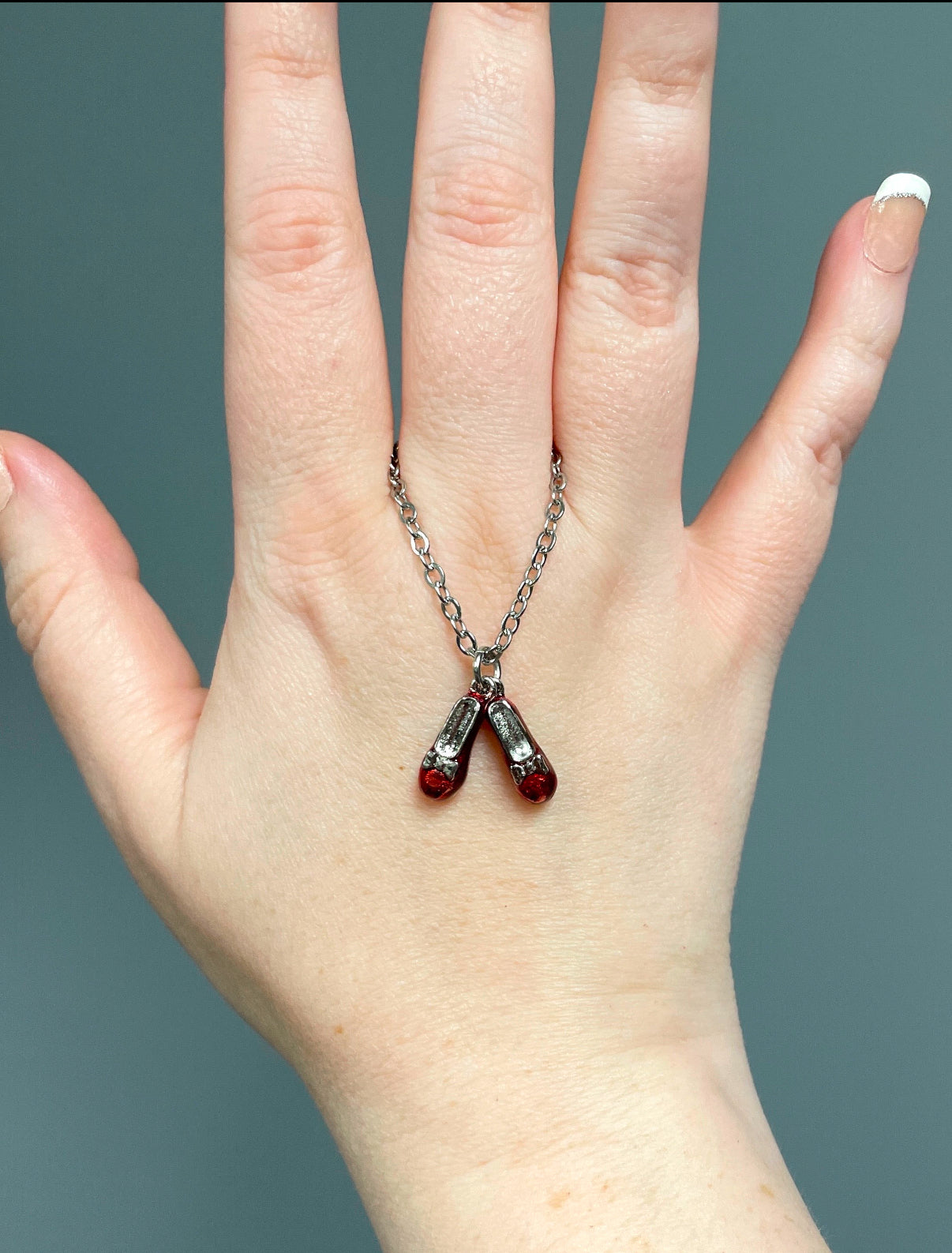 Red slippers necklace