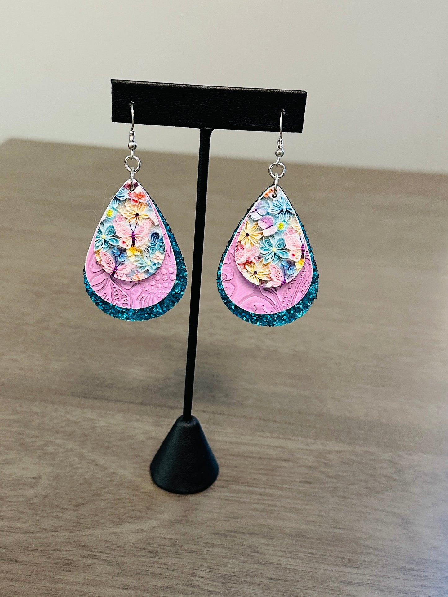 Butterfly blue and purple faux leather and stainless steel earrings