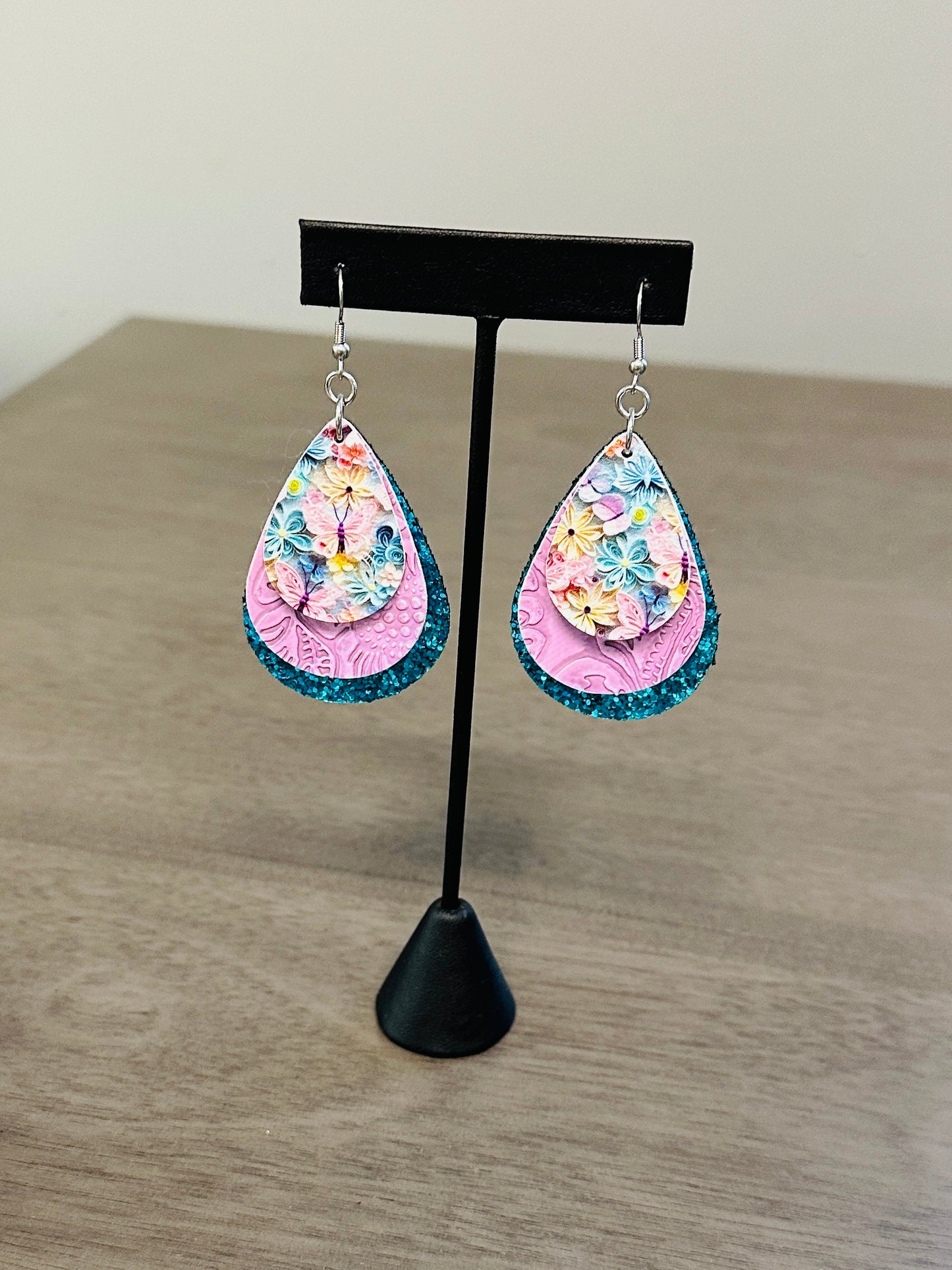 Butterfly blue and purple faux leather and stainless steel earrings