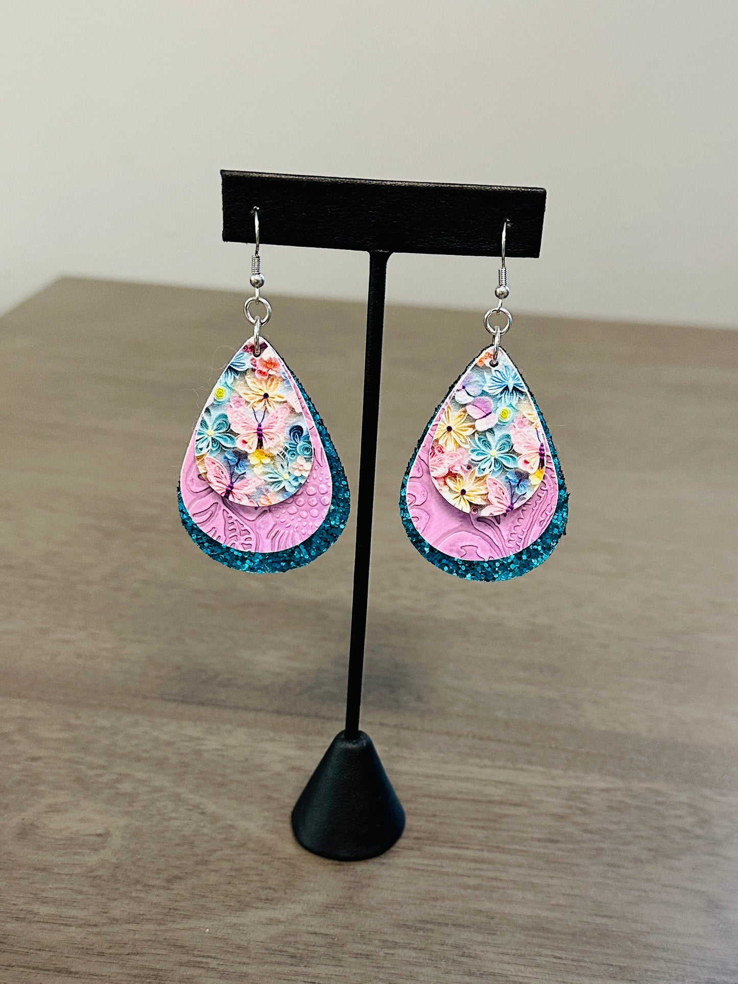 Butterfly blue and purple faux leather and stainless steel earrings