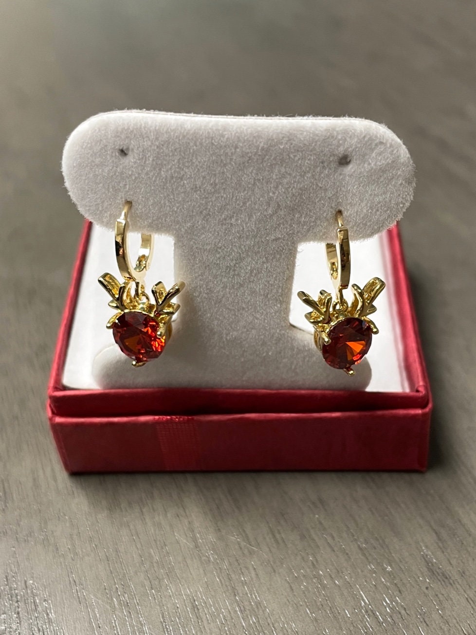 red cubic zirconia gold plated reindeer earrings