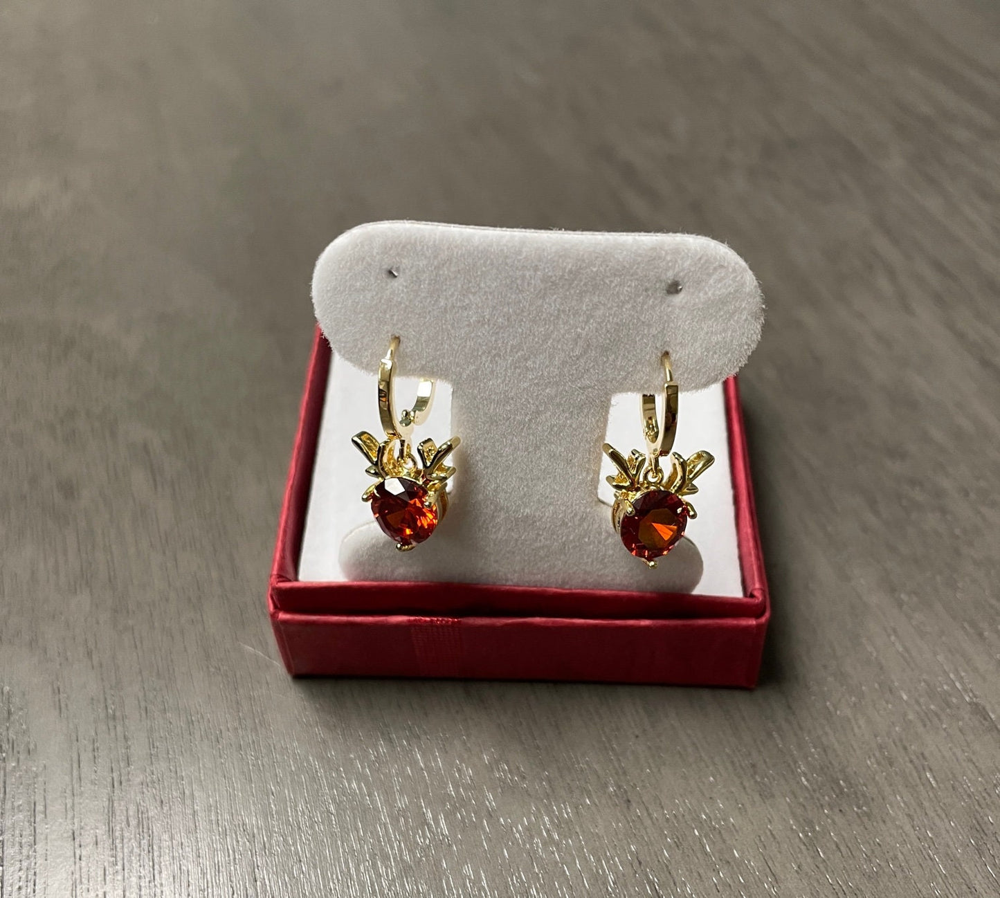 red cubic zirconia gold plated reindeer earrings