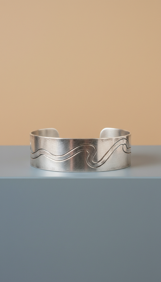 Handcrafted silver cuff bracelet with hammered texture