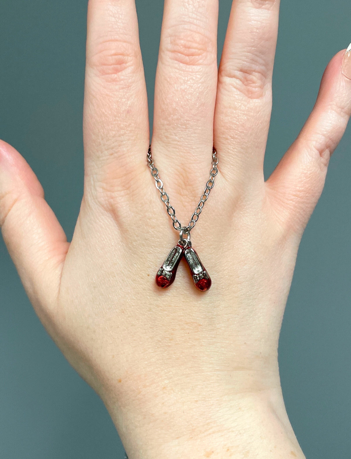 Red slippers necklace