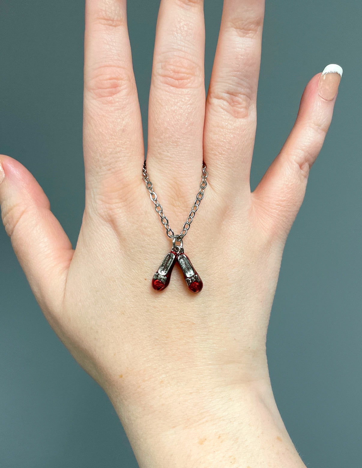 Red slippers necklace