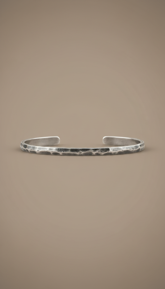 Hand-forged sterling silver artisan bangle