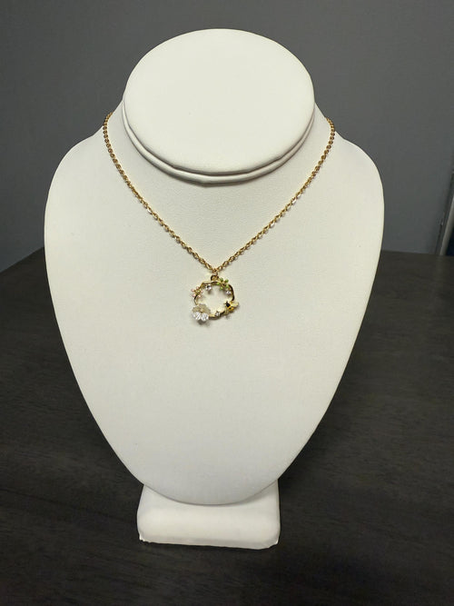 bee and flower necklace with an 18 inch gold plated chain