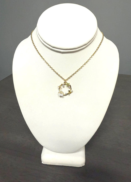 bee and flower necklace with an 18 inch gold plated chain