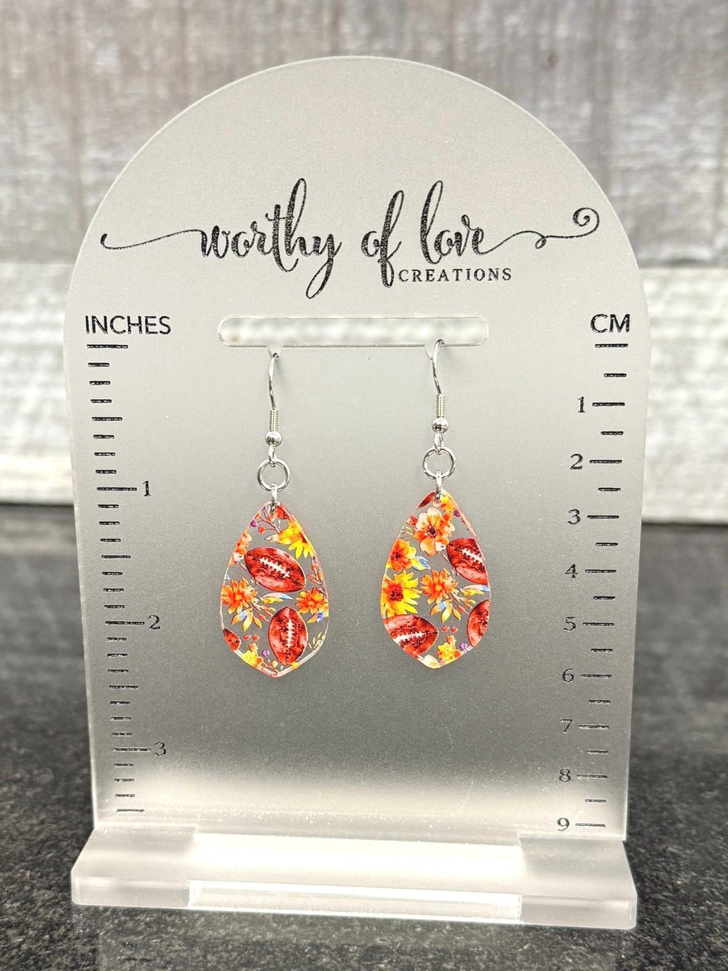 Football floral print earrings