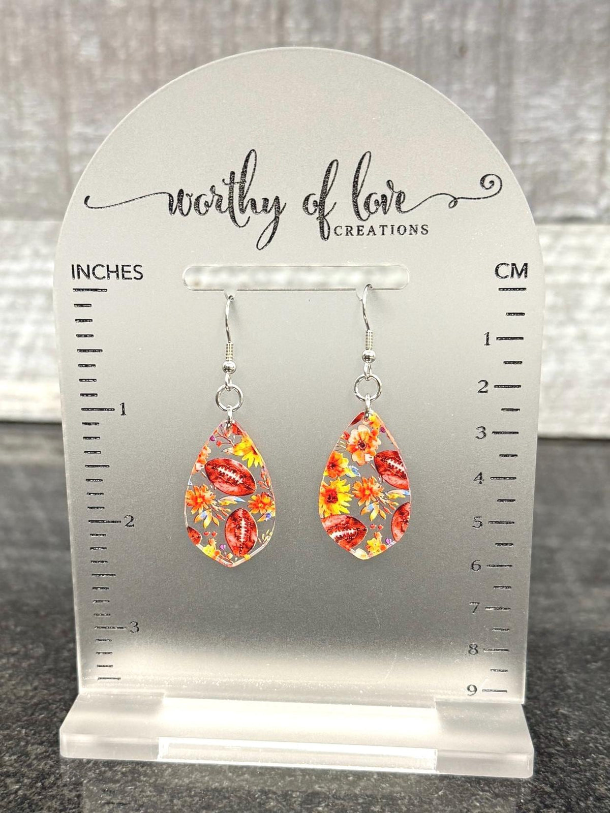 Football floral print earrings