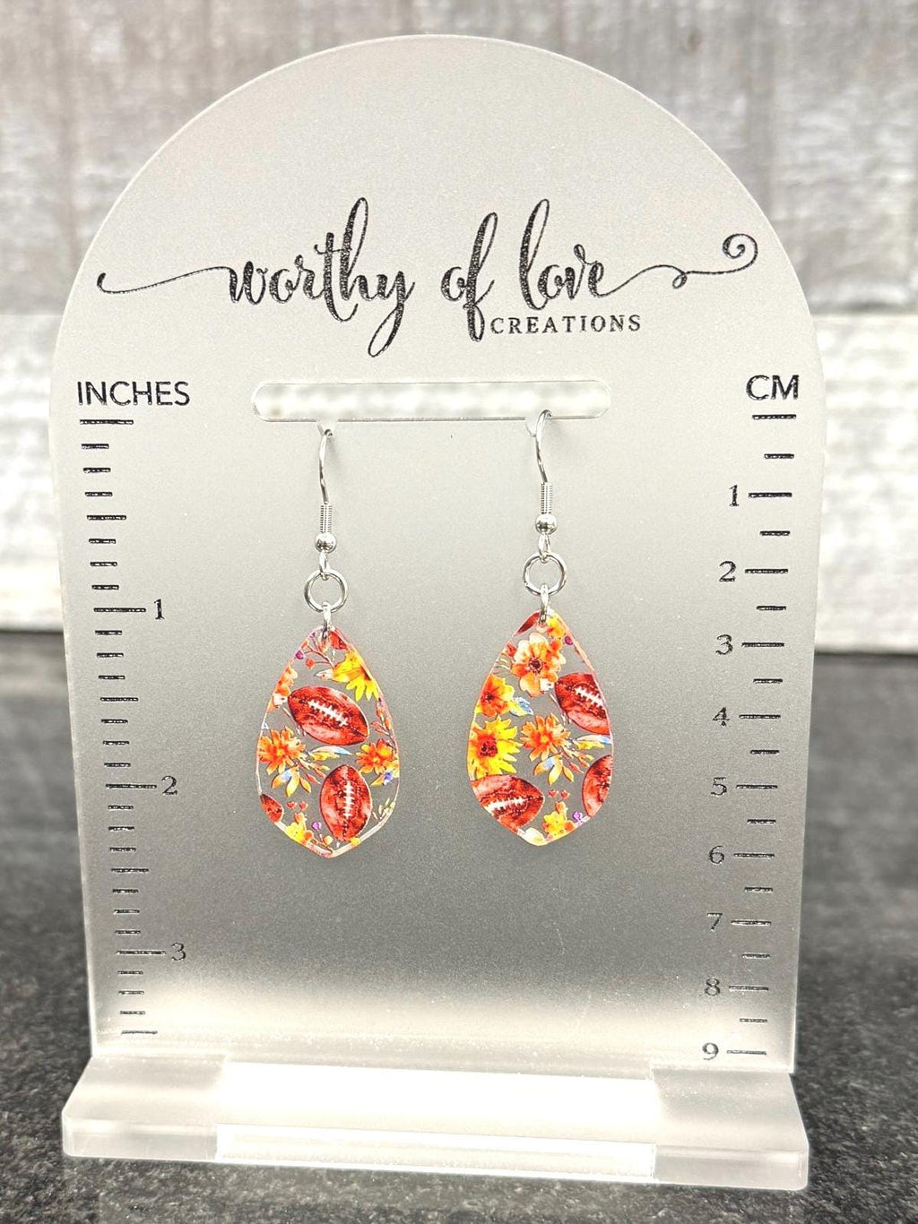 Football floral print earrings