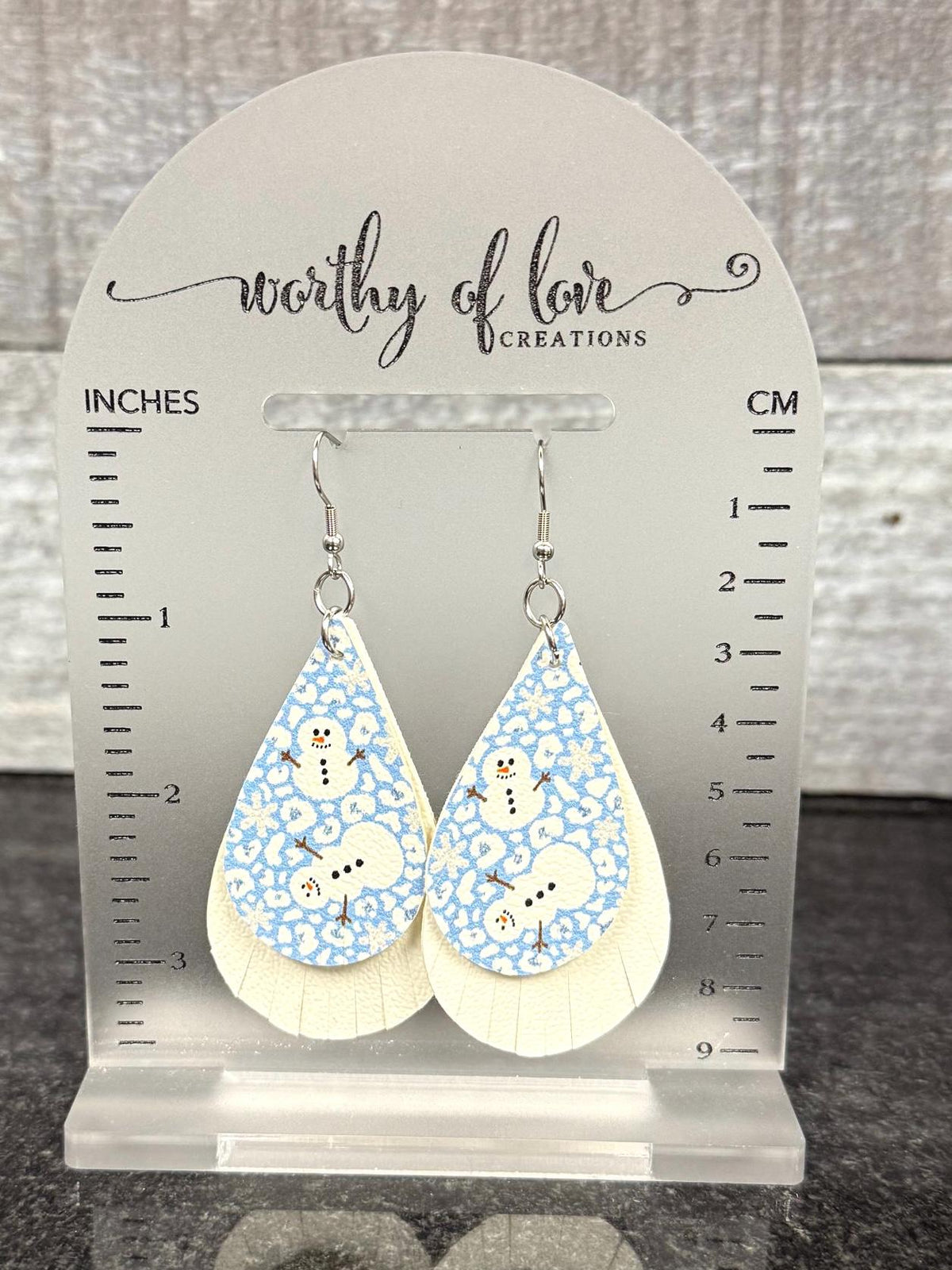 Snowman blue and white faux leather earrings stainless steel