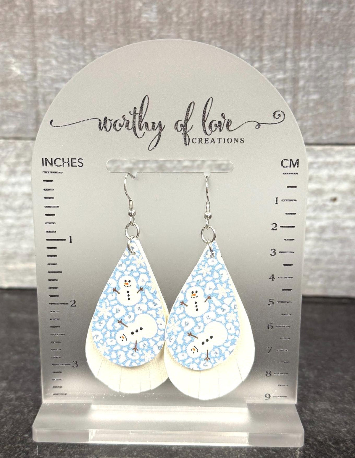 Snowman blue and white faux leather earrings stainless steel