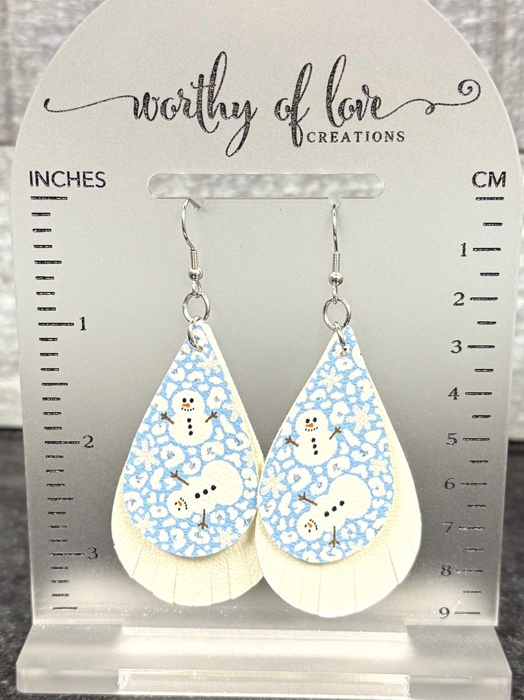 Snowman blue and white faux leather earrings stainless steel