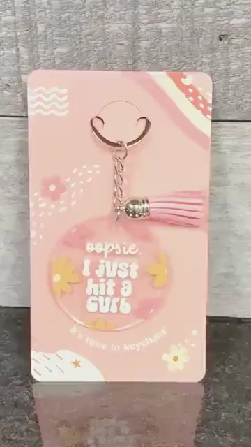Oopsie, I just hit a curb keychain