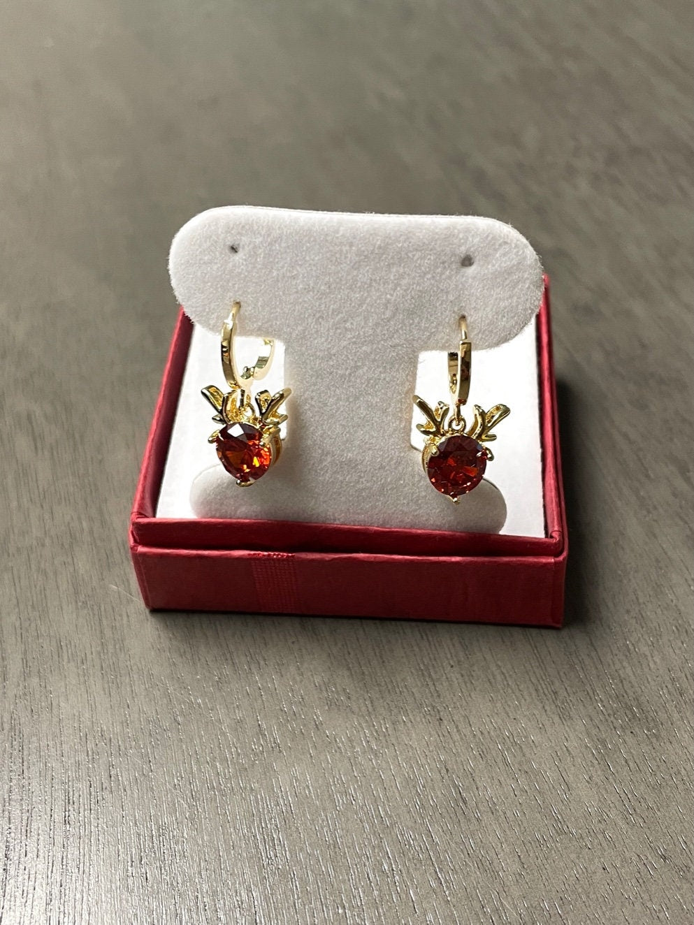 red cubic zirconia gold plated reindeer earrings
