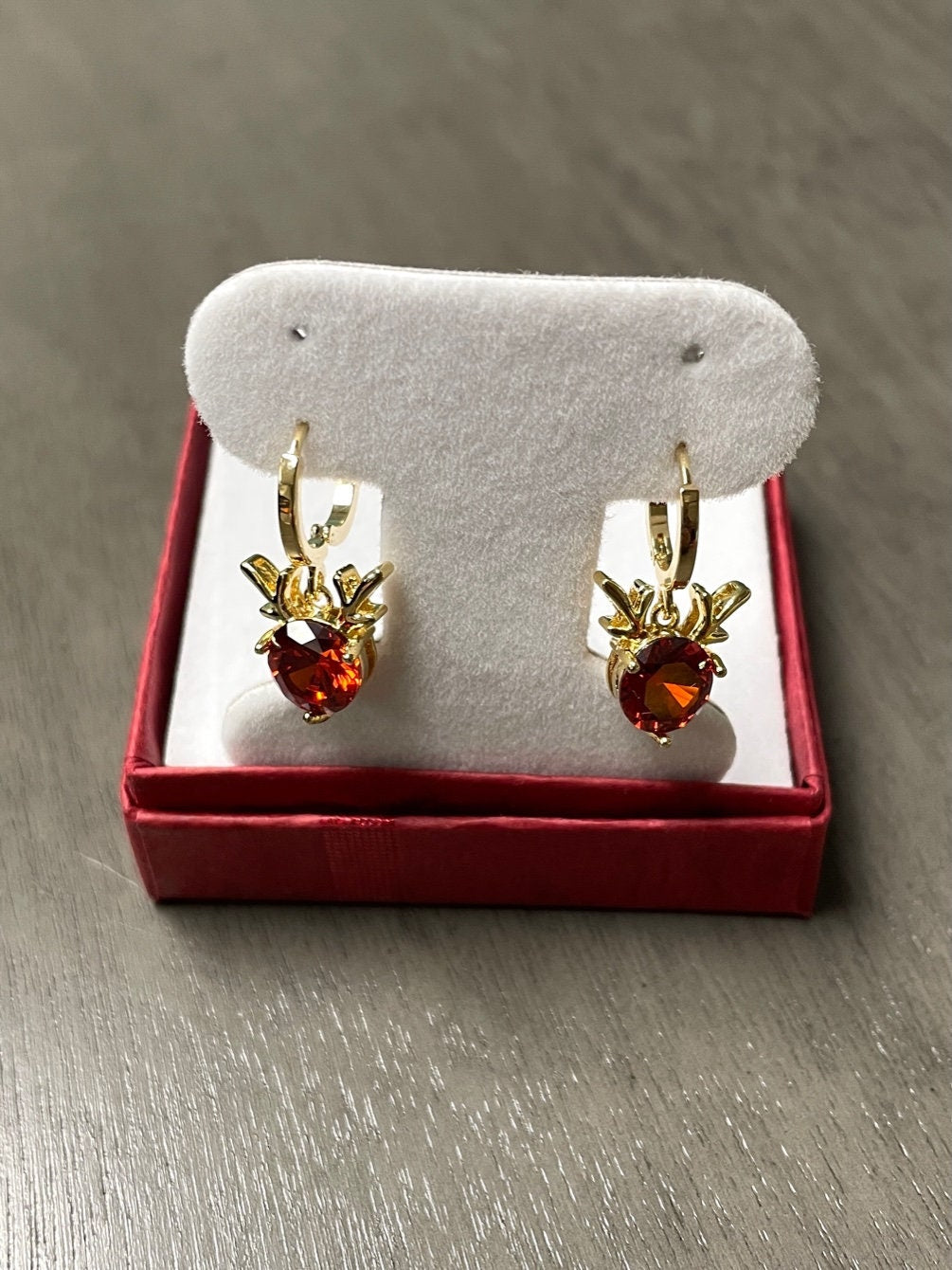 red cubic zirconia gold plated reindeer earrings